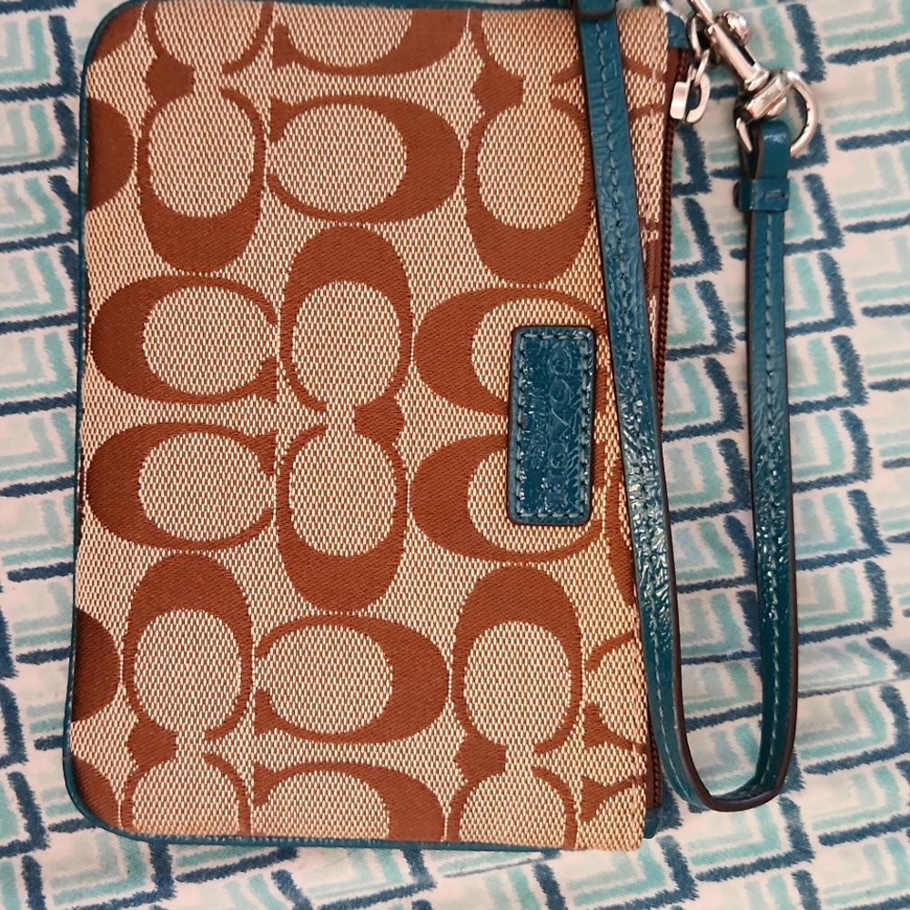 Brand new Coach wristlet.